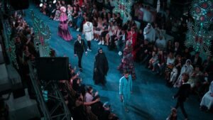 Models walking on a fashion show stage