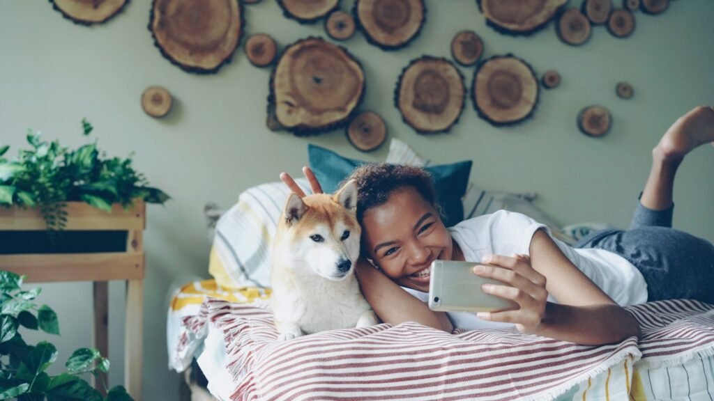 Woman taking a selfie with her dog